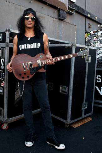 Slash with the first Gibson made after the Nashville flood